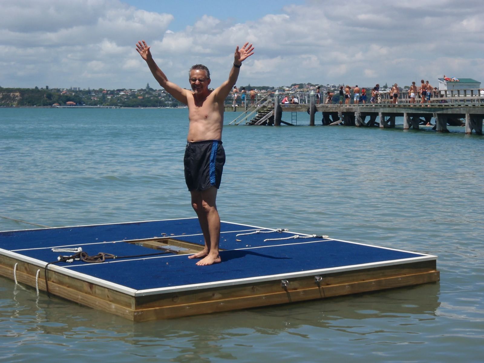 Swimmer standing on the Cheltenham community swim raft