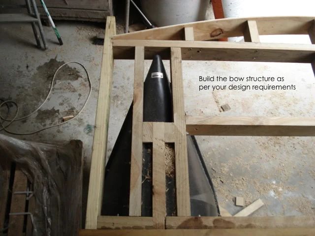Timber bow structure being built around a Bow Pod