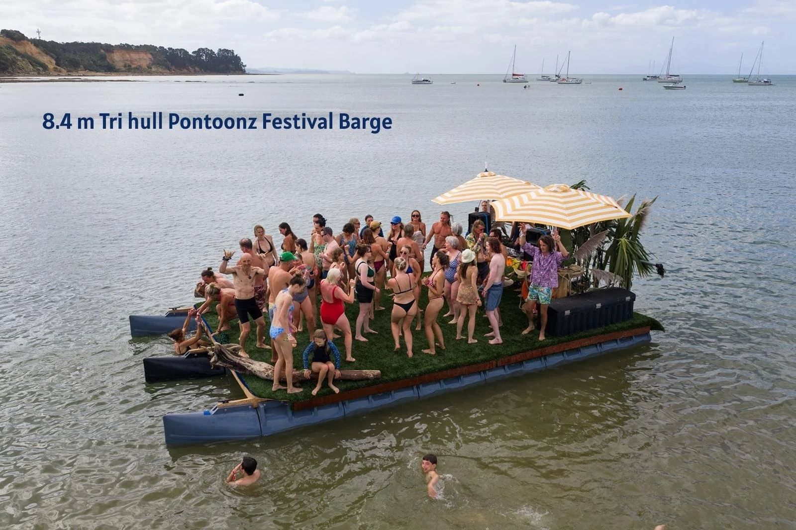 8.4 metre tri-hull festival barge carrying a crowd of people on Pontoonz pods