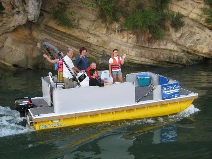 Passengers aboard an early demo boat
