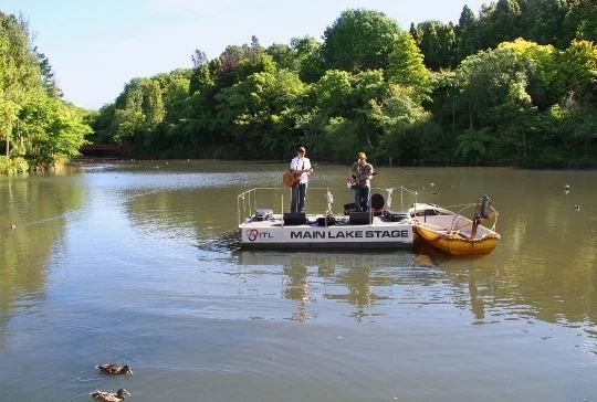 Musicians on a floating lake stage