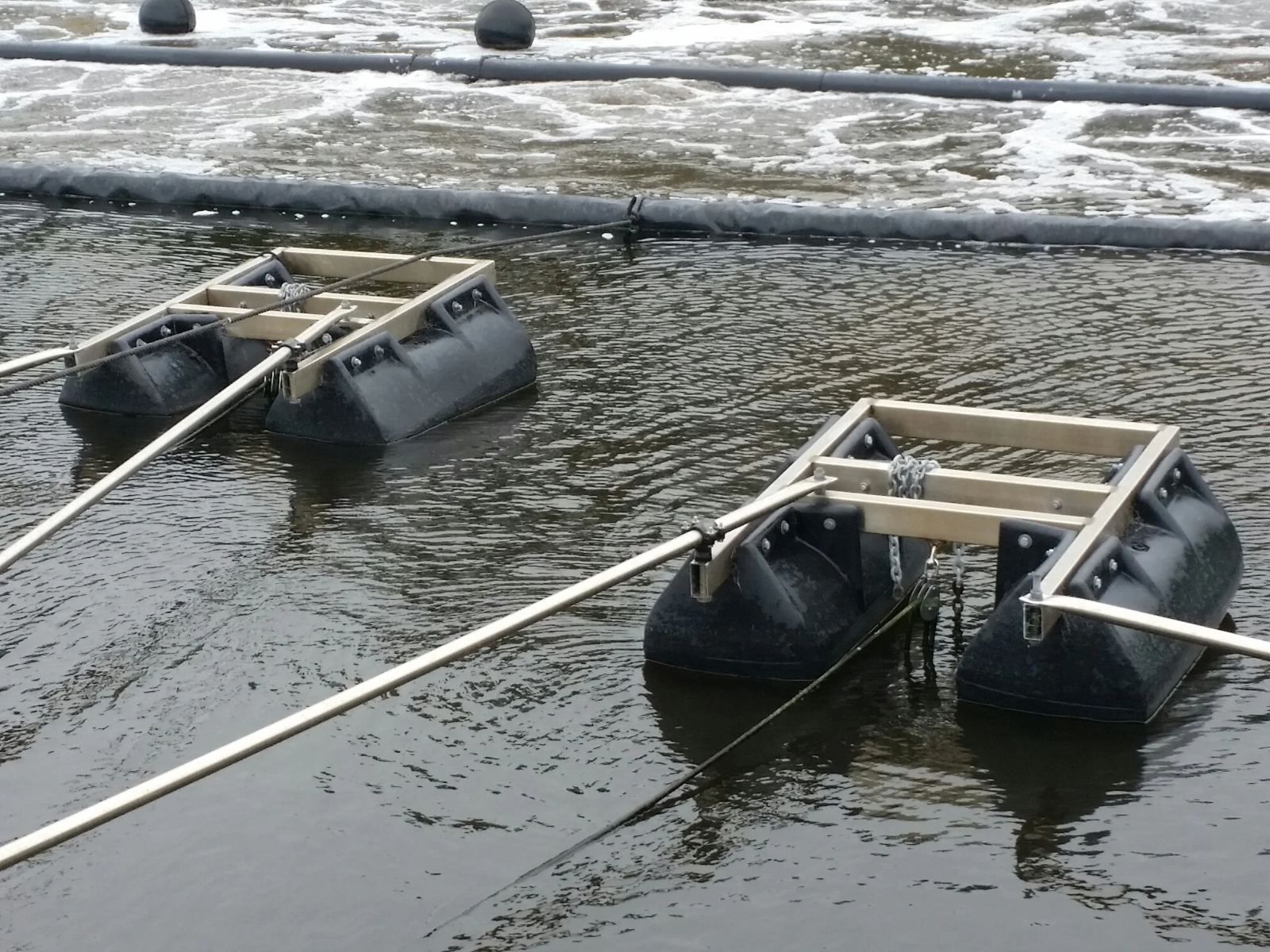Floating pod frames on a pond