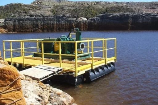 Yellow-railed pump barge