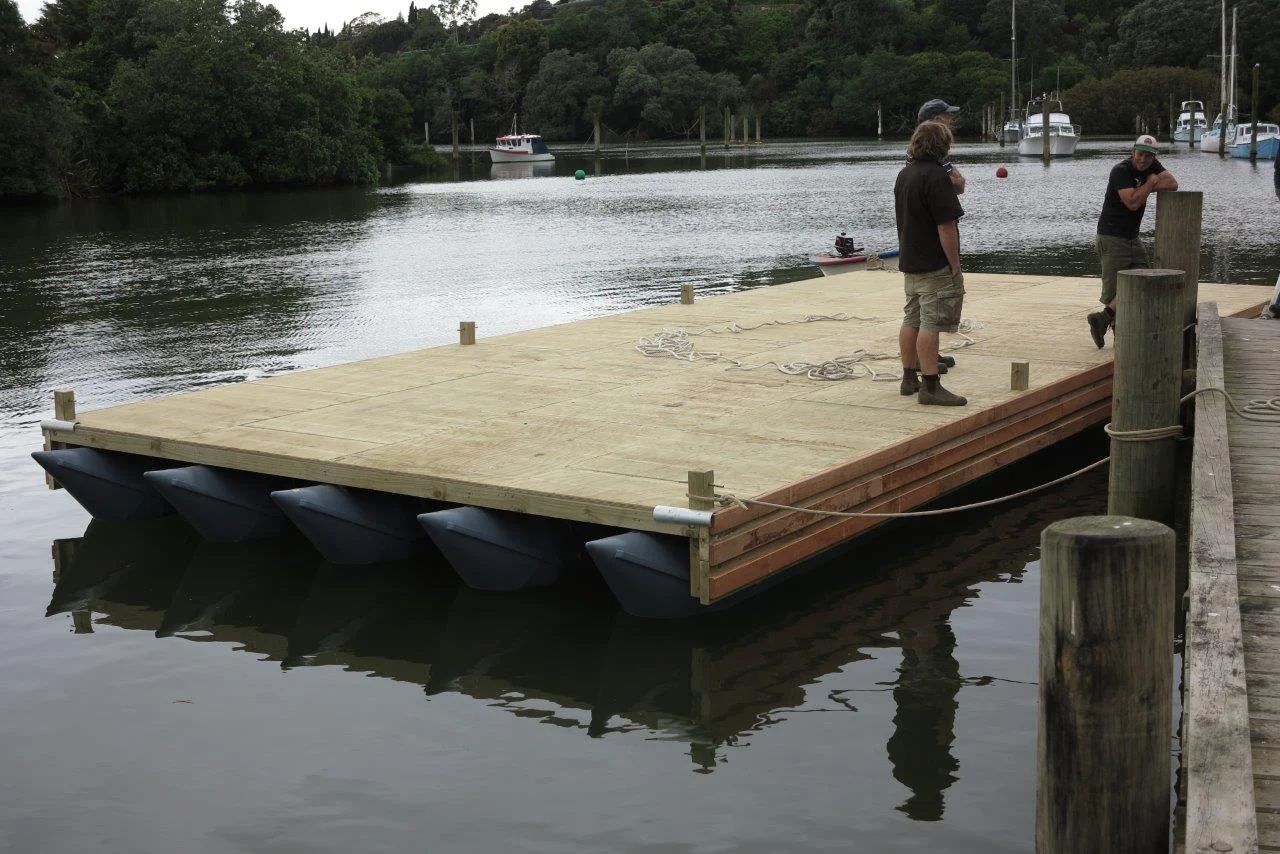 Timber raft platform beside a wharf