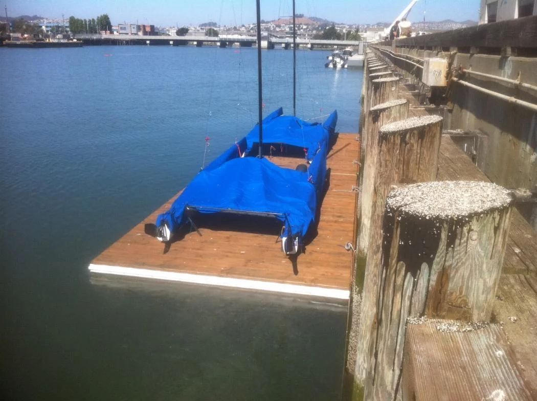 Covered boat on a floating dock