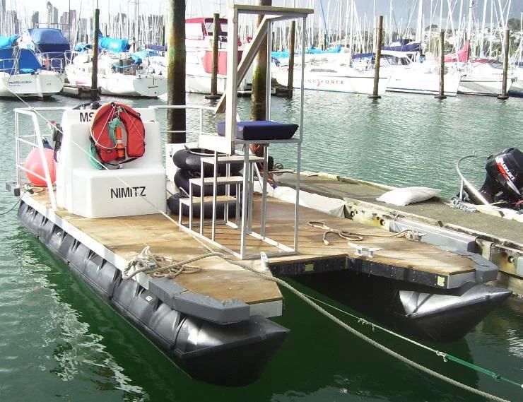 Pile-servicing work barge on Pontoonz pods at Westhaven Marina, Auckland